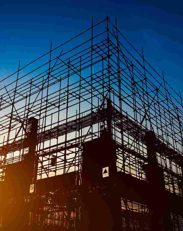 Scaffolding against sunset